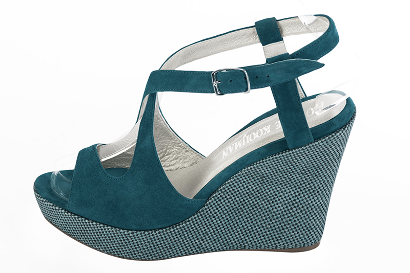 Peacock blue women's open back sandals, with crossed straps. Round toe. Very high wedge soles. Profile view - Florence KOOIJMAN